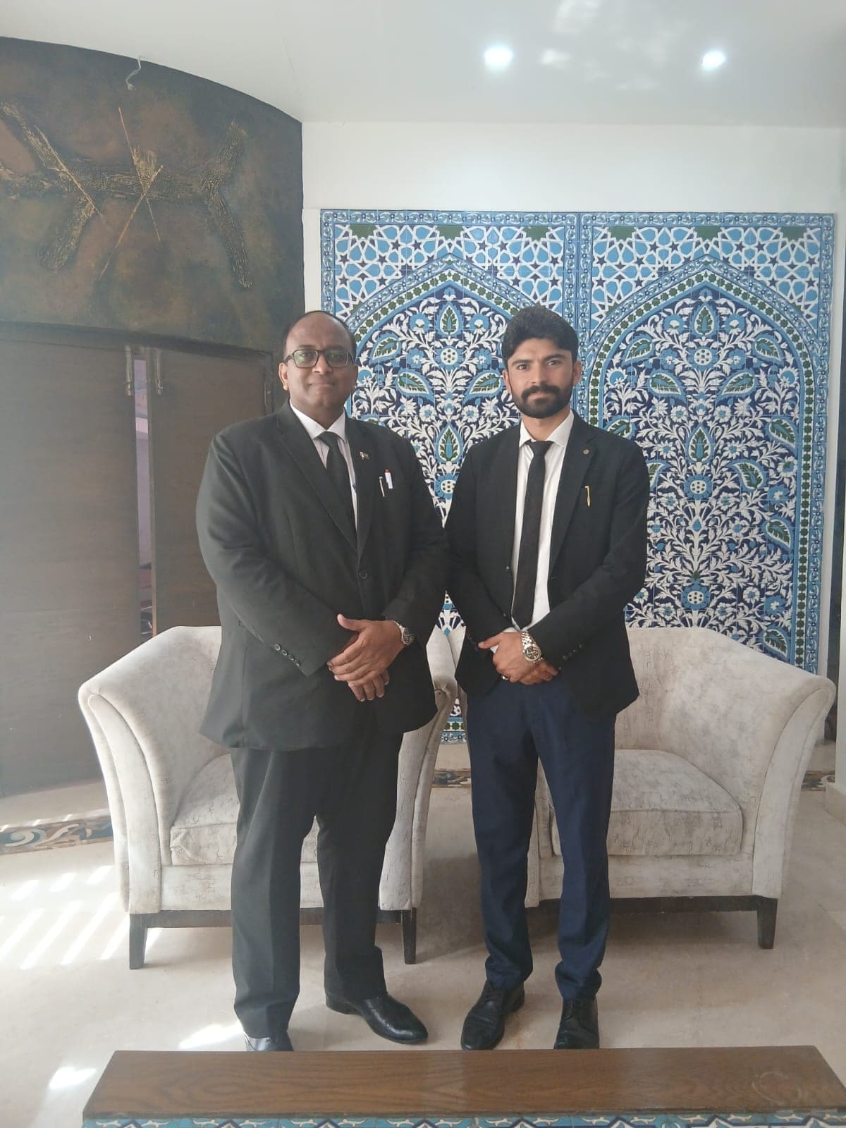 Ghulam Shabbir Babar with a colleague